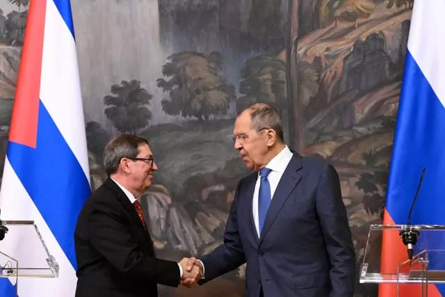 Russian foreign minister Sergei Lavrov shakes hands with his Cuban counterpart, Bruno Rodriguez