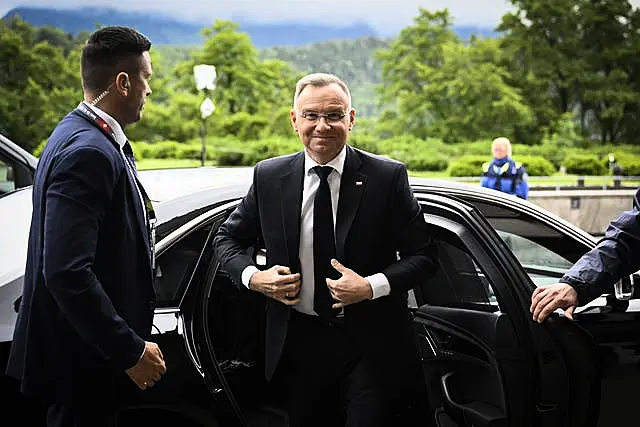 Andrzej Duda, President of Poland, gets out of a car at the summit 