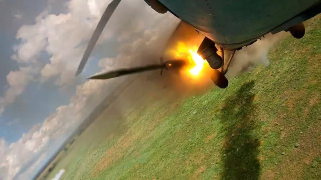 A Russian combat helicopter firing rockets during a mission over Ukraine