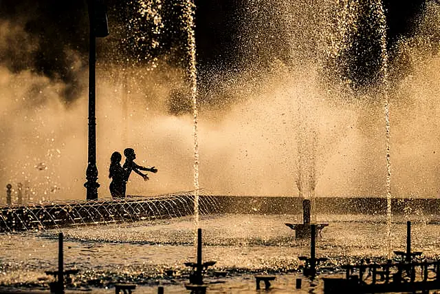 Children in a fountain