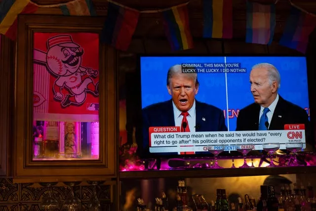 Head shots of Donald Trump and Joe Biden on a TV screen