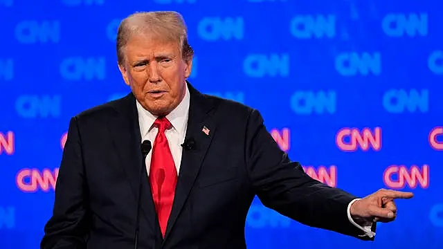 Republican presidential candidate former president Donald Trump speaks during a presidential debate with US President Joe Biden 