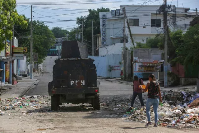 An armoured police vehicle patrols in Port-au-Prince, 