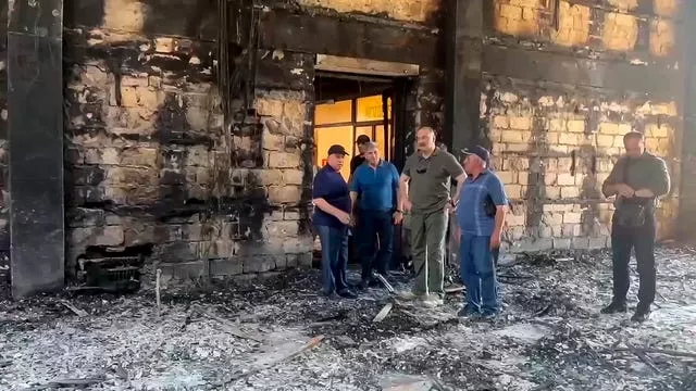 Dagestan governor Sergei Melikov visiting the damaged the Kele-Numaz synagogue in Derbent