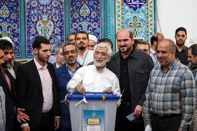 Saeed Jalili casts his ballot at a polling station in Tehran, Iran