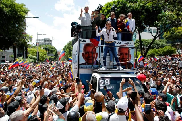 Opposition leader Maria Corina Machado addresses the crowd 