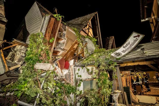 The collapsed hotel, an unrecognisable pile of debris