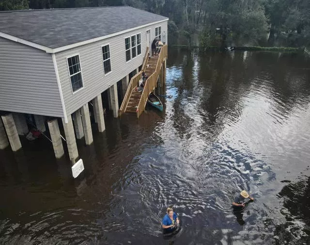 An area half a mile from the Alafia River in Florida is inundated with waist-high water after rainfall from Tropical Storm Debby