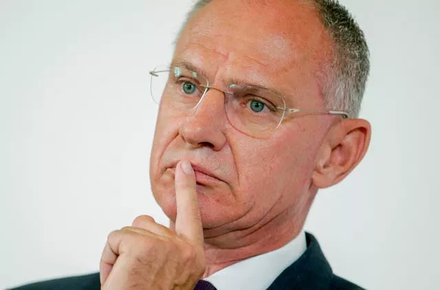 Austrian interior minister Gerhard Karner with a finger to his lips