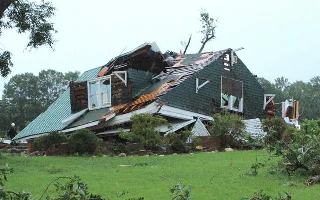 A house is damaged by a tornado 