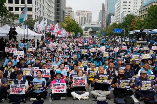 South Korean protesters stage a rally opposing the joint military exercises 