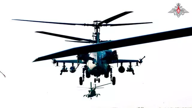 Ka-52 helicopter gunships of the Russian air force take off to air strike on concentrations of manpower, armoured vehicles and automobile military equipment of the Ukrainian armed forces in the border area of the Kursk region 