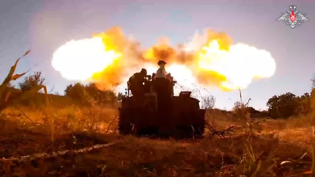 Russian tank fires guns