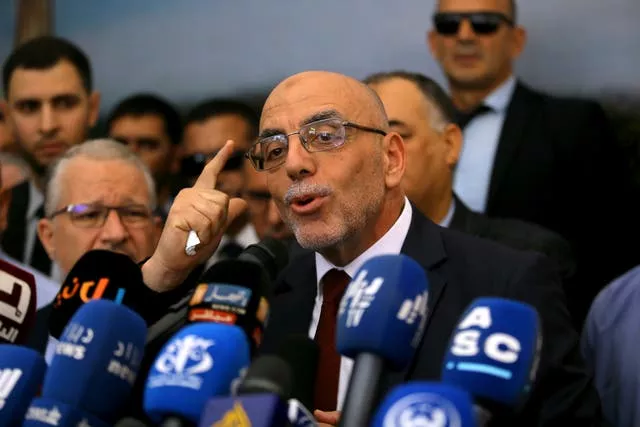 Abdelali Hassani Cherif speaking to reporters