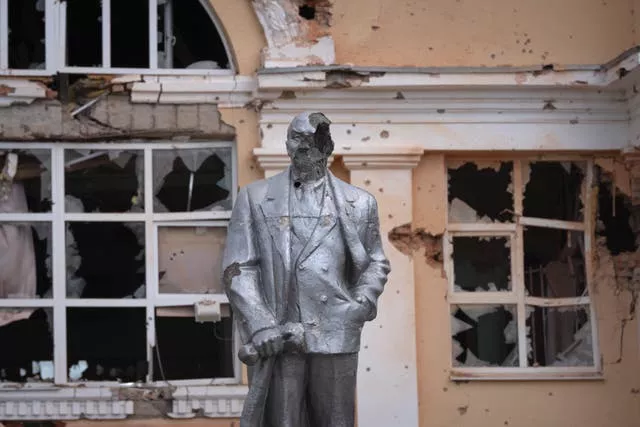 A damaged monument to Soviet founder Vladimir Lenin stands in a central square in Russia's Kursk region