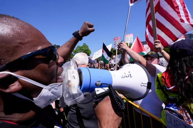 Protesters demonstrate at Union Park before a march to the Democratic National Convention