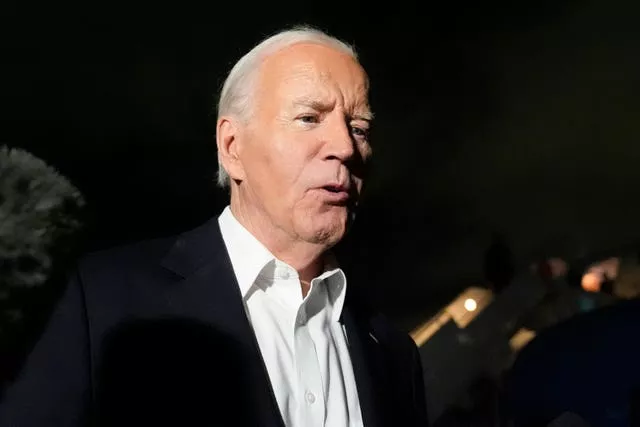 President Joe Biden speaks to the press before boarding Air Force One at Chicago O’Hare International Airport in Chicago