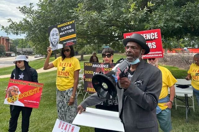 Joseph Amrine, who was exonerated two decades ago after spending years on death row, speaks at a rally to support Missouri death row inmates Marcellus Williams