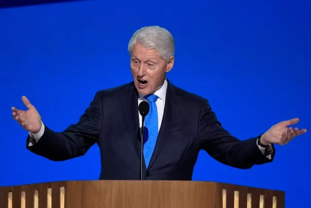 Bill Clinton gestures during his speech