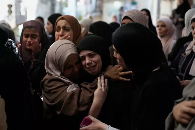 Women weeping in the West Bank