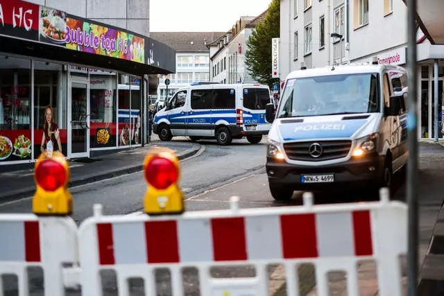 Police cars at a cordon after several people were killed and injured in an attack at Solingen’s 650th anniversary celebrations 