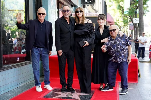 Michael Keaton, Tim Burton, Monica Bellucci, Winona Ryder and Danny DeVito arrive at a ceremony honouring Burton with a star on the Hollywood Walk of Fame 