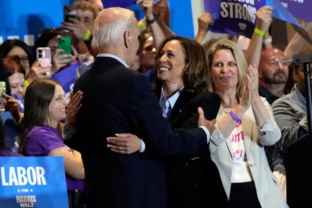 Democratic presidential nominee US Vice President Kamala Harris with President Joe Biden