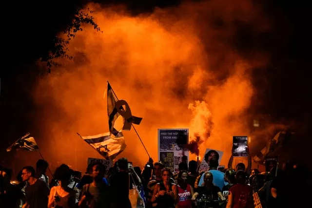 People in Tel Aviv attend a rally demanding a ceasefire deal and the immediate release of hostages held by Hamas in the Gaza Strip after the deaths of six hostages in the Palestinian territory