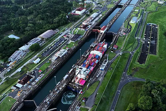 A cargo ship traverses the Agua Clara Locks of the Panama Canal in Colon, Panama 