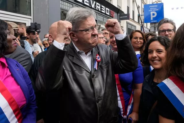 Jean-Luc Melenchon joining a protest in Paris