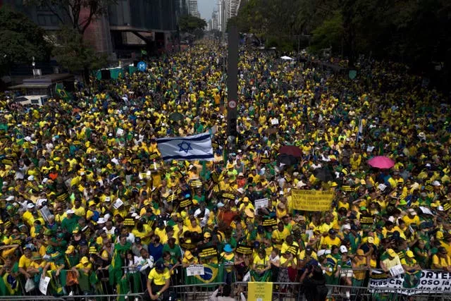 Demonstrators take part in a protest calling for the impeachment of Alexandre de Moraes