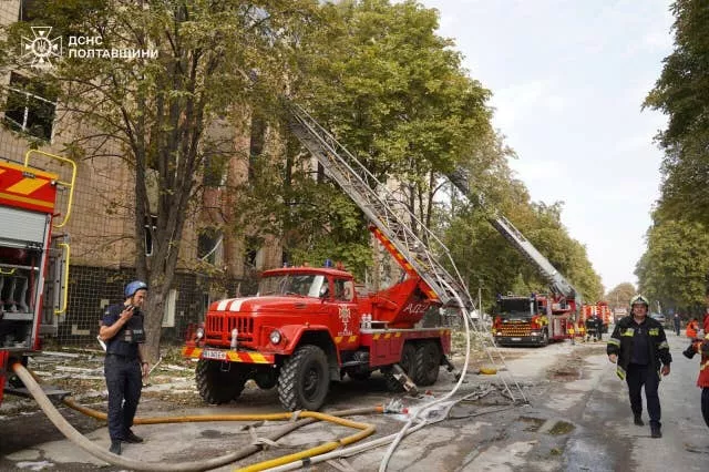 Rescue workers work at a site of military university hit by a Russian strike in Poltava, Ukraine on September 4