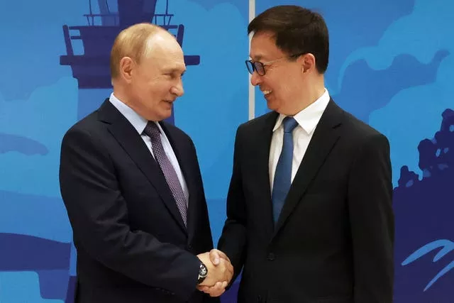 Russian President Vladimir Putin and China’s vice president Han Zheng shake hands during their meeting on the sidelines of the Eastern Economic Forum in Vladivostok, Russia, on September 4