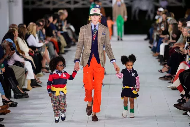 Male model and two child models walk NYFW S/S 2025 Ralph Lauren – Runway