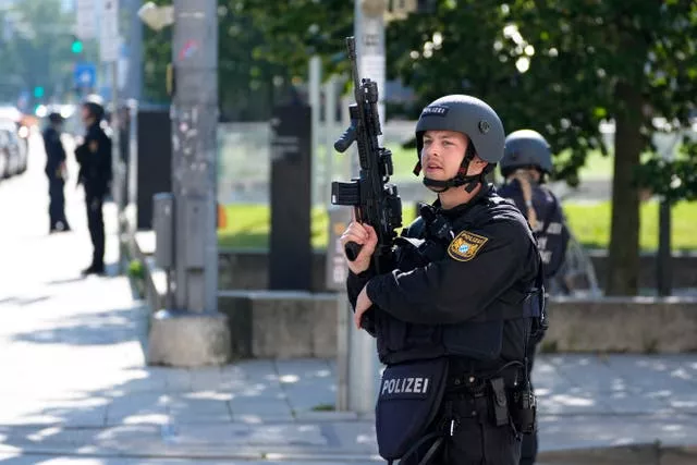 Police officers near the  scene after officers fired shots at a suspicious person near the Israeli Consulate and a museum on the city’s Nazi-era history in Munich 