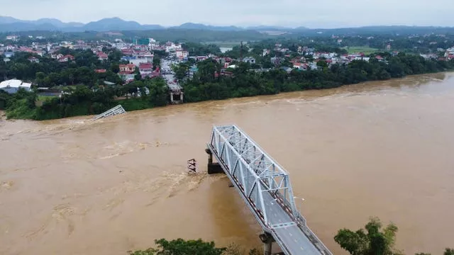 A bridge collapse due to floods triggered by typhoon Yagi in Phu Tho province