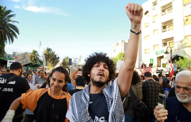 Tunisians take part in a protest against President Kais Saied ahead of the upcoming elections in Tunis last month 