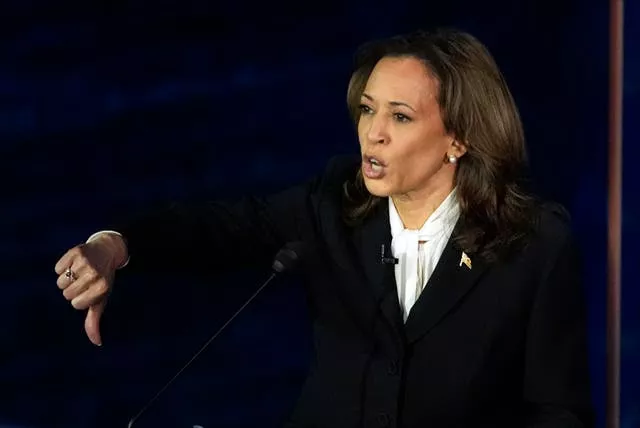 Democratic presidential nominee Vice President Kamala Harris gestures as she speaks during the presidential debate 