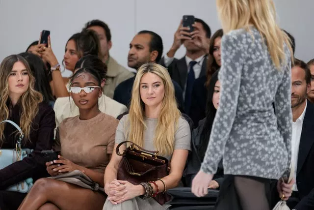 Shailene Woodley, centre, attends the Fendi Spring Summer 2025 collection