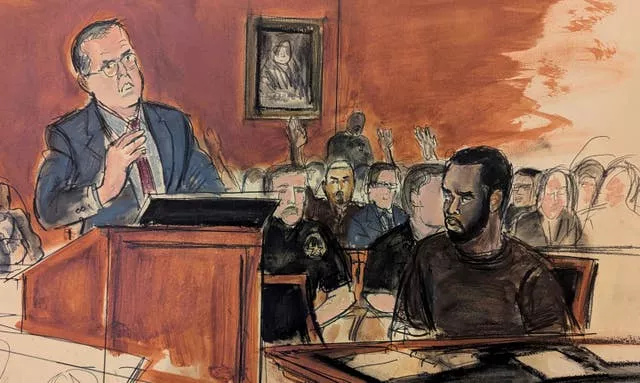 A courtroom sketch of Sean Combs with his attorney Marc Agnifilo (Elizabeth Williams via AP)