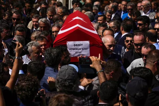 People attend the funeral prayers for Aysenur Ezgi Eygi outside the central mosque of Didim