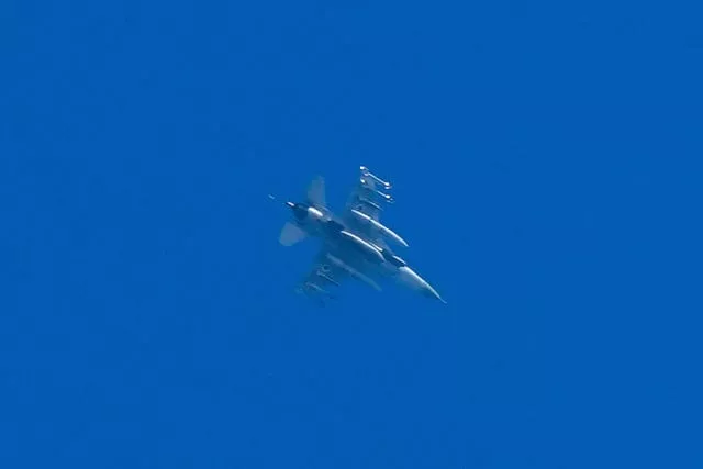 An armed Israeli fighter jet is seen from Haifa, northern Israel