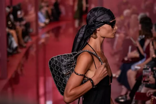 A model wears a creation as part of the Gucci Spring Summer 2025 collection