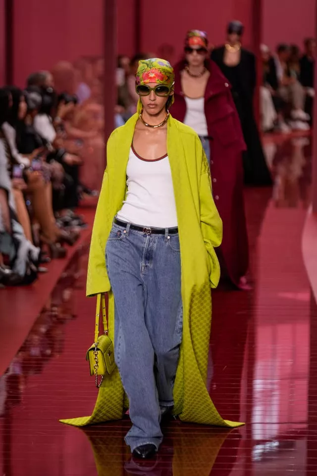 A model wears a creation as part of the Gucci Spring Summer 2025 collection