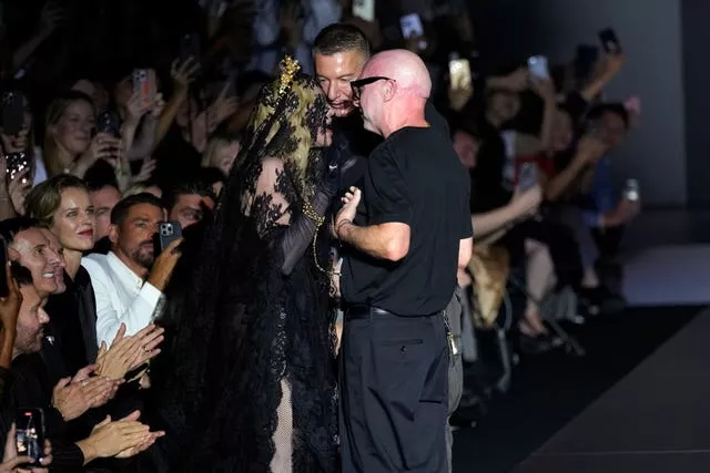 Madonna with Dolce & Gabbana at the end of the show