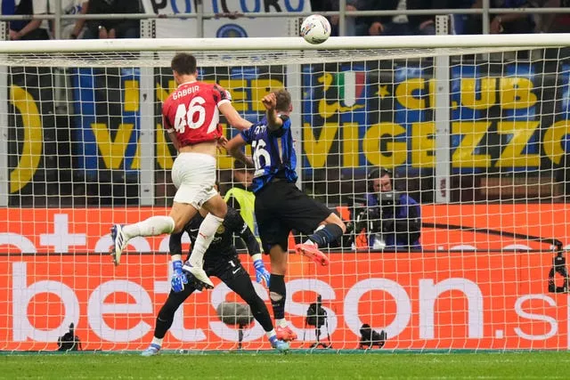 AC Milan’s Matteo Gabbia (left) scores a late winner at Inter Milan