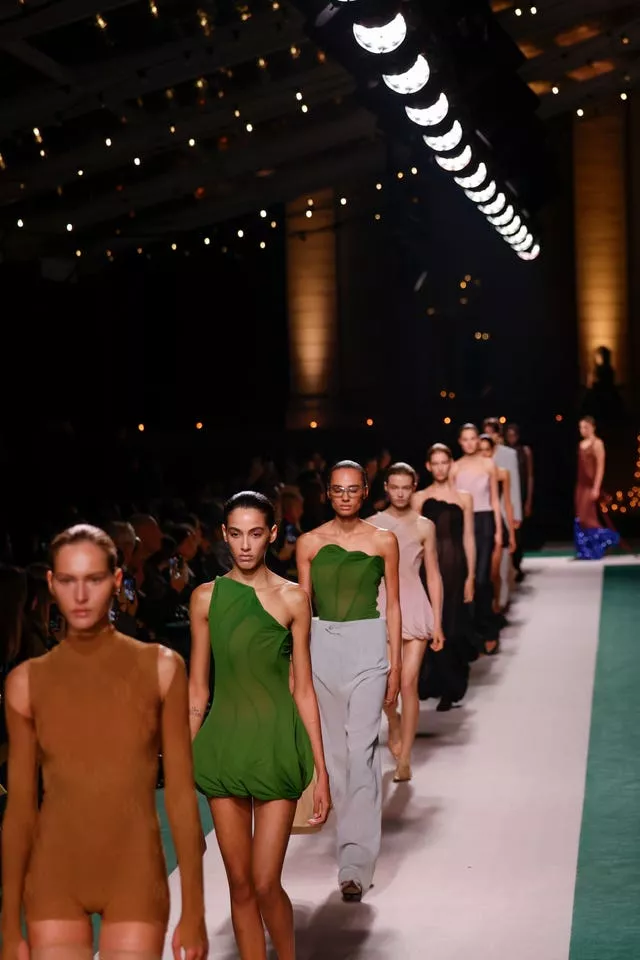 Models on the catwalk for Victoria Beckham's Paris Fashion Week show