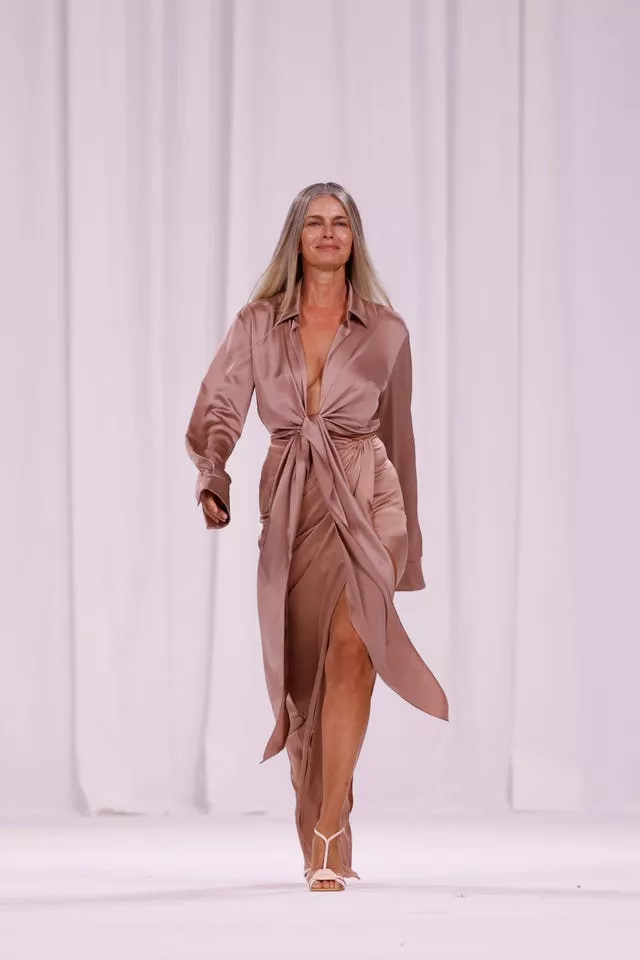 Paulina Porizkova wears a creation as part of the Balmain Spring/Summer 2025 collection