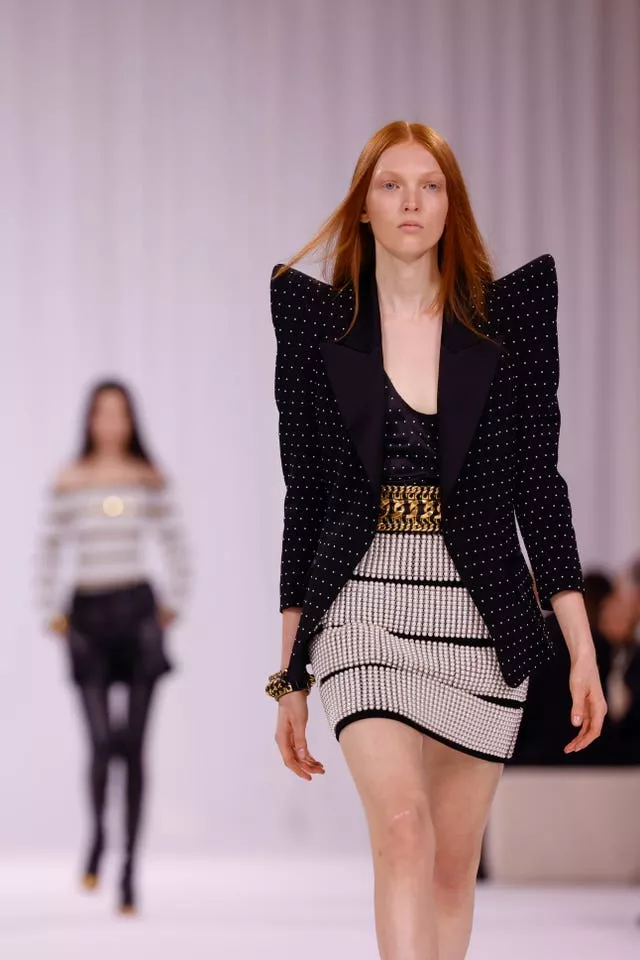 A model wears a creation as part of the Balmain Spring/Summer 2025 collection