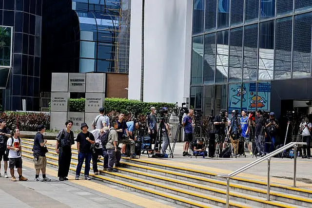 Media line up outside the District Court in Wan Chai, Hong Kong 